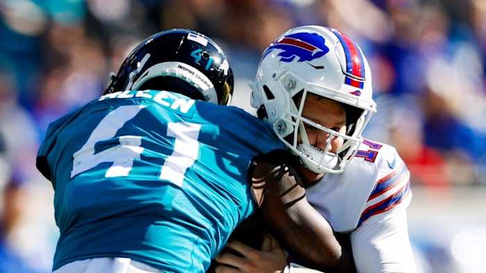 Jaguars outside linebacker Josh Allen (41) sacks Buffalo Bills quarterback Josh Allen (17).